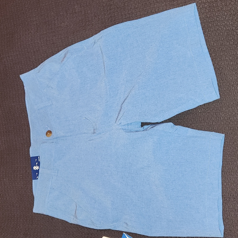 Brand New IZOD Boys flat front stretch shorts in blue, size 14